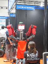 Dressing and undressing assistance robot at Kyushu Institute of Technology Graduate School